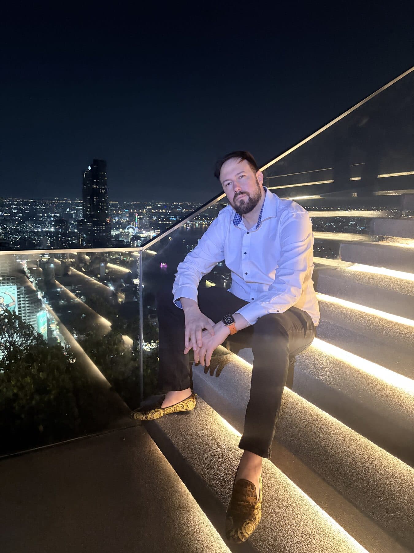 Oliver Edward Locke III, known as Oliver Locke, founder of Eclix Technologies, on the stairs of Lebua Tower in Bangkok